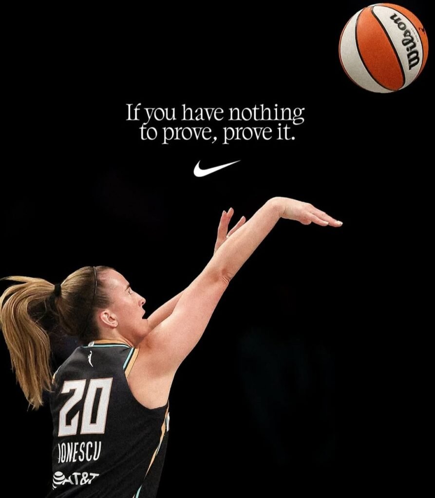 A player playing basketball and sposnsring Nike